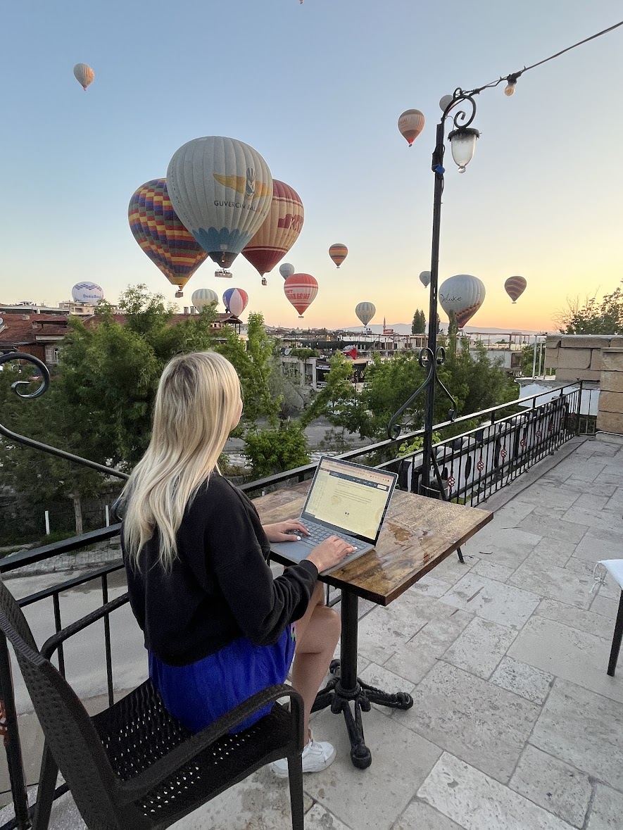 Andrae Smith, founder of Work Wanderers, working from a rooftop in Cappadocia